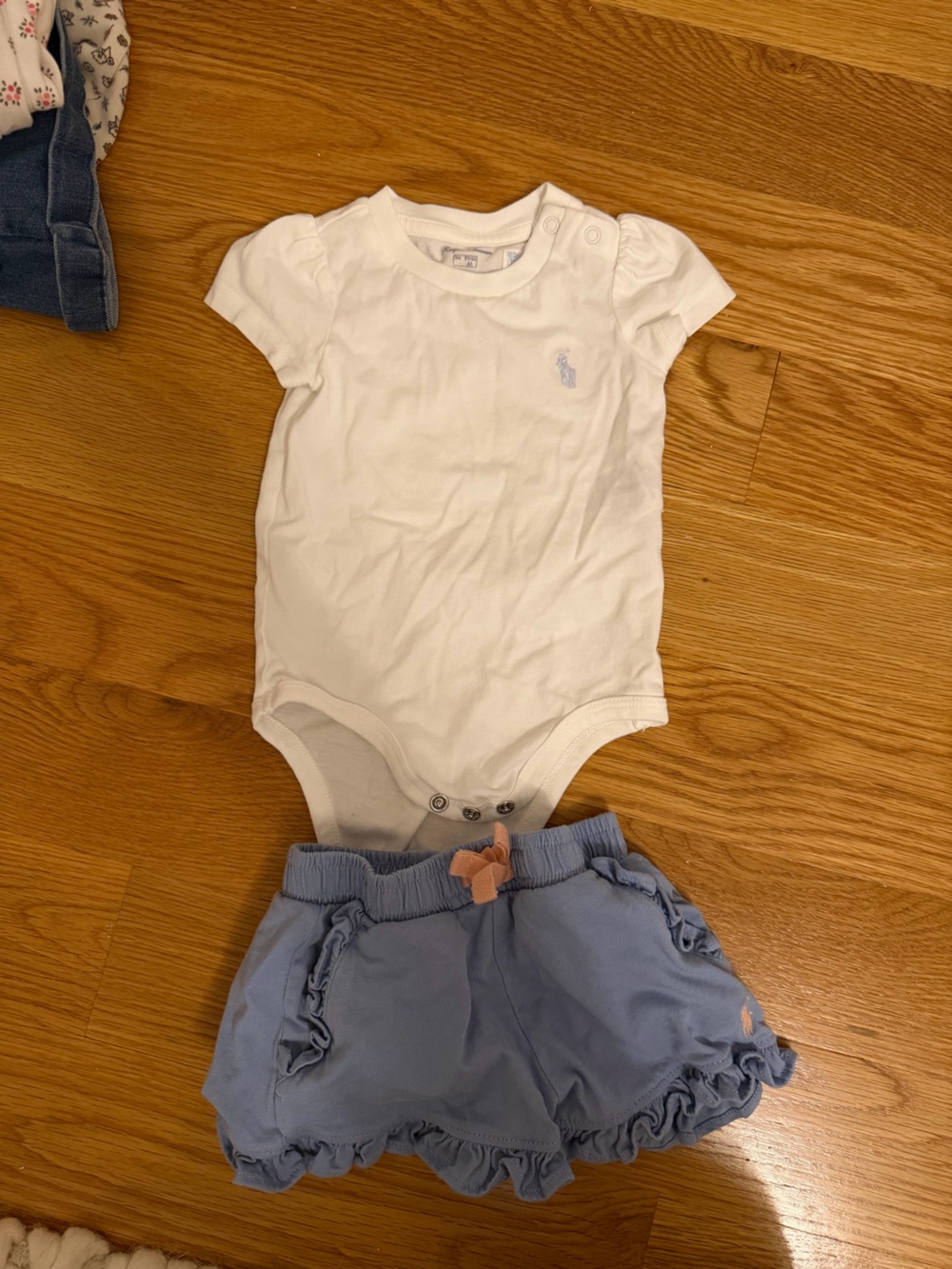 Ralph Lauren White Onesie with Light Blue Ruffle Shorts